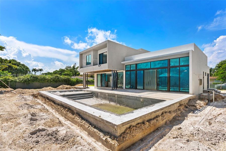 Front exterior of a new home in , Pinecrest, FL, highlighting curb appeal (Image 29). Front exterior of a new home in , Pinecrest, FL, highlighting curb appeal (Image 29).