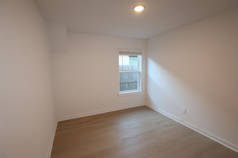 Spacious, unfurnished interior of a new home in Sorella, Tomball (Image 6).