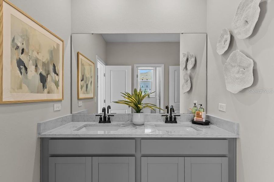 Furnished interior view inside a new home in The Cypress Series at Reserve East, Flagler Beach (Image 18).