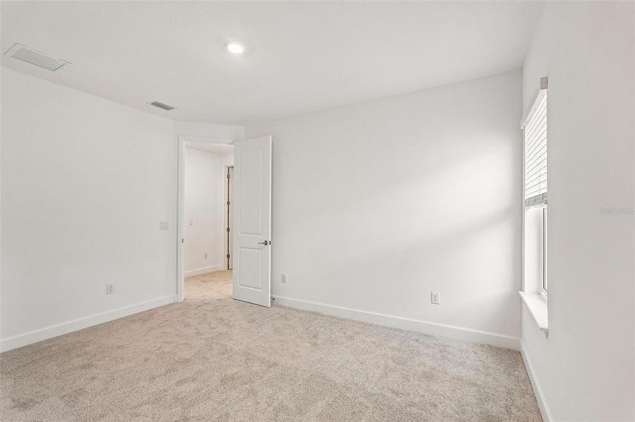 Spacious, unfurnished interior of a new home in Tiburon, Nokomis (Image 45).