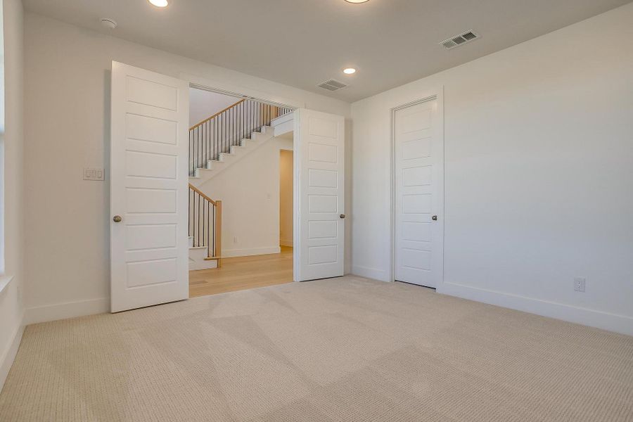 Representative unfurnished interior of a home built from the Eleanor by Graham Hart Home Builder in Sweetgrass, Haslet (Image 33).
