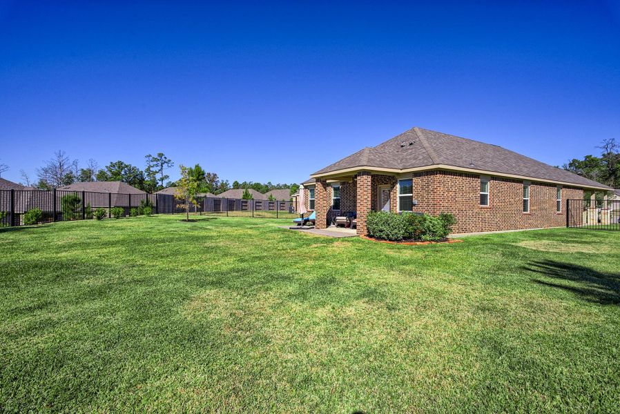 Exterior details and patio area of a home in Wedgewood Forest, Conroe (Image 21). Exterior details and patio area of a home in Wedgewood Forest, Conroe (Image 21).