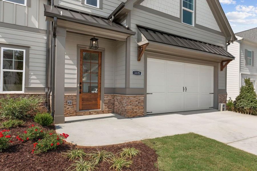 Front exterior of a new home in Hillshire, Cumming, GA, highlighting curb appeal (Image 18). Front exterior of a new home in Hillshire, Cumming, GA, highlighting curb appeal (Image 18).