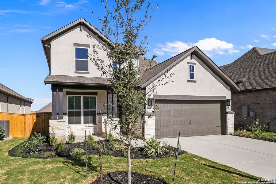 Front exterior of a new home in Mayfair 50', New Braunfels, TX, highlighting curb appeal (Image 24).