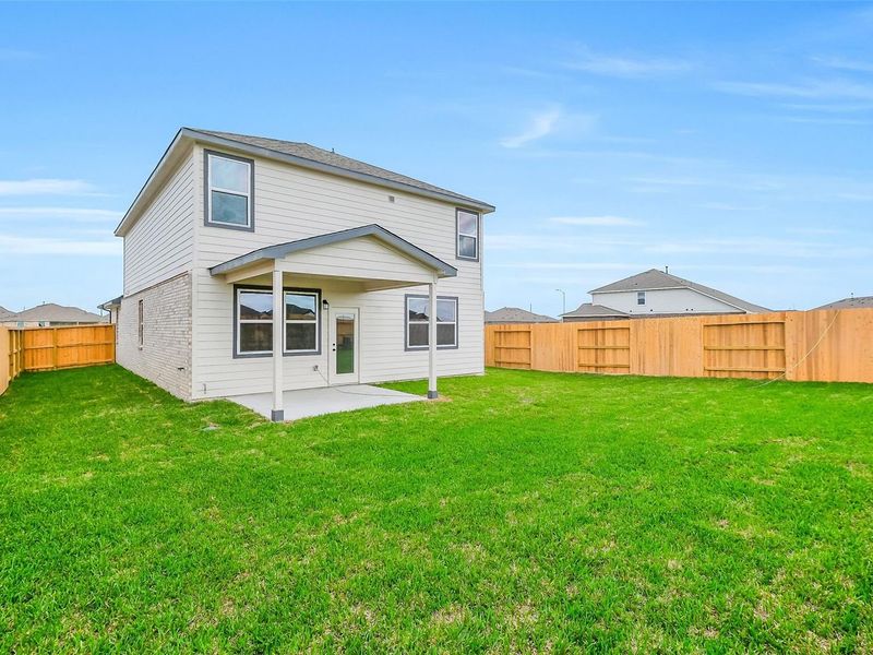 Exterior details and patio area of a home in Emberly, Beasley (Image 27).
