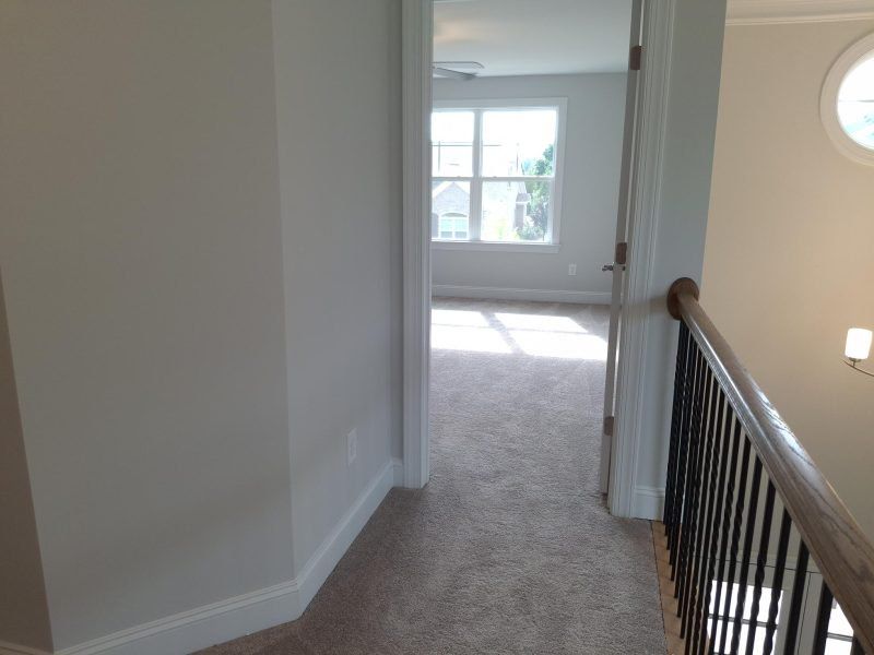 Spacious, unfurnished interior of a new home in Weybridge, Burlington (Image 50).
