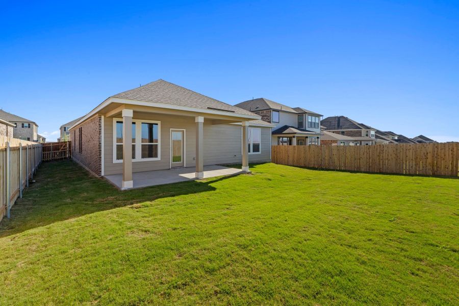Exterior details and patio area of a home in Salerno - Classic Collection, Round Rock (Image 3). Exterior details and patio area of a home in Salerno - Classic Collection, Round Rock (Image 3).