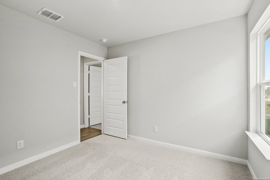 Spacious, unfurnished interior of a new home in Hickory Ridge, Elmendorf (Image 25).