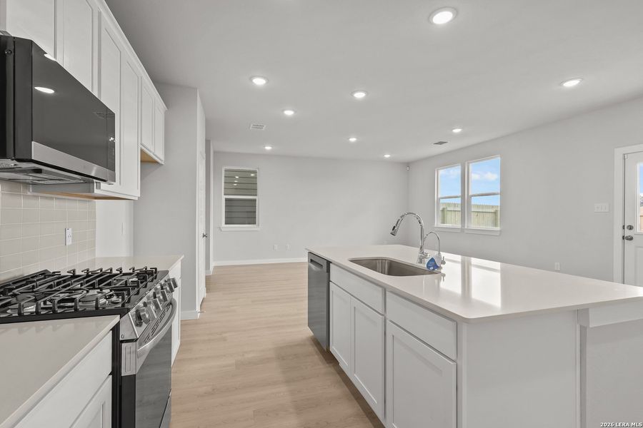 Furnished interior view inside a new home in Senna, Leon Valley (Image 7).
