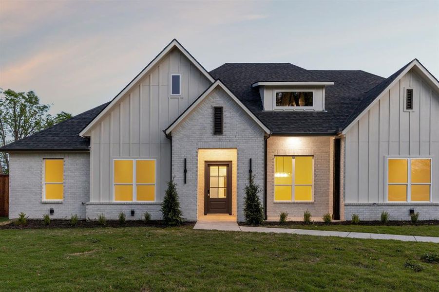 Front exterior of a new home in , Rowlett, TX, highlighting curb appeal (Image 2). Front exterior of a new home in , Rowlett, TX, highlighting curb appeal (Image 2).