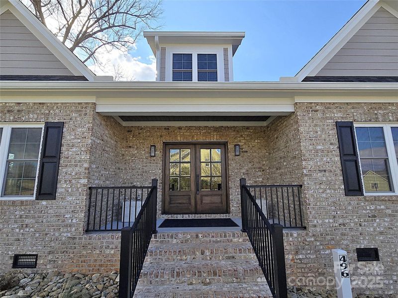 Front exterior of a new home in , Hickory, NC, highlighting curb appeal (Image 21).