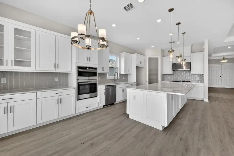 Furnished interior view inside a new home in Coasterra Community Group Page, Palmetto (Image 5).