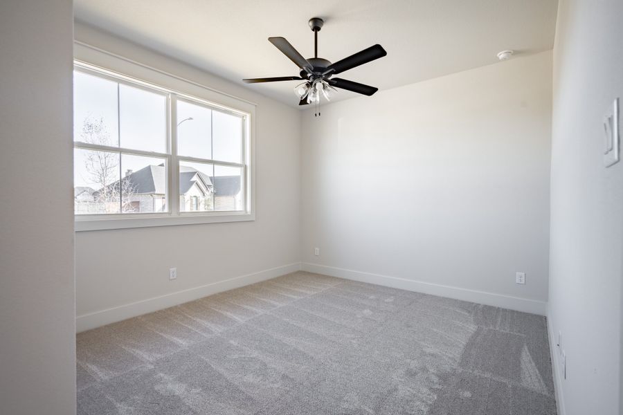 Representative unfurnished interior of a home built from the The Addison by Reece Homes in Pebble Creek, College Station (Image 25).