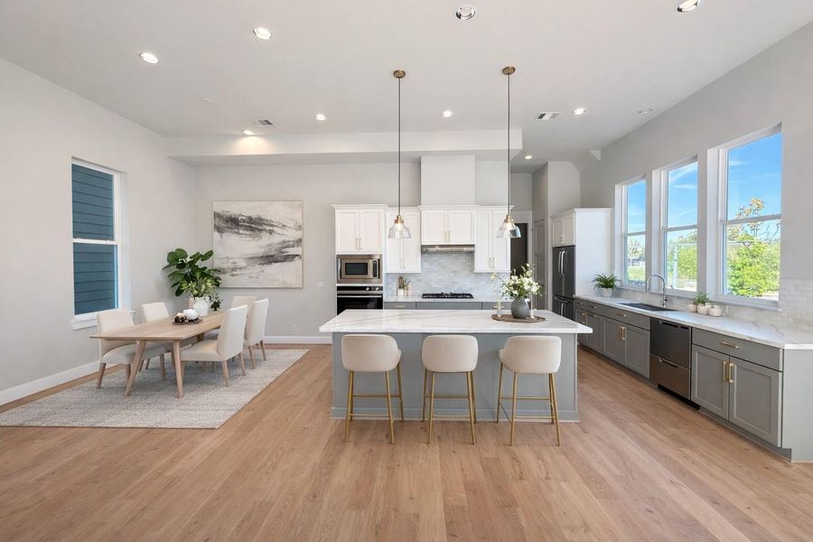 Avondale's Park and Trails are Next Door, so Great Light Comes into the Kitchen.  European Style Cabinetry and Luxury Fisher Paykel Appliances