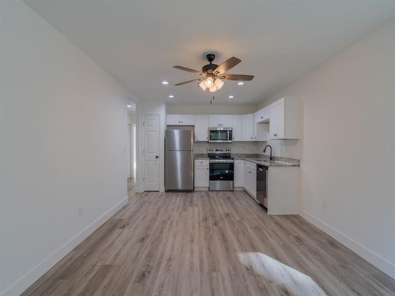 Spacious, unfurnished interior of a new home in , Fort McCoy (Image 22).