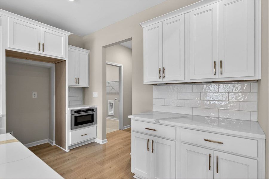 Furnished interior view inside a new home in Blackwelder Bluff, Bowdon (Image 13).