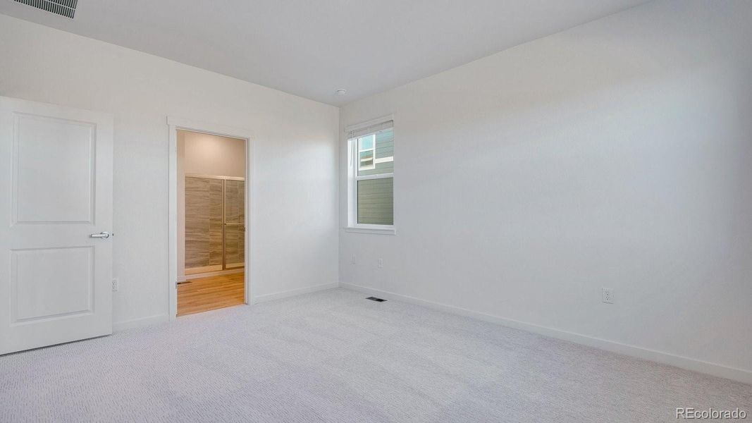 Spacious, unfurnished interior of a new home in Trails at Crowfoot, Parker (Image 23).