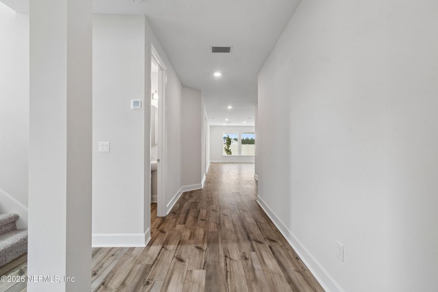 Spacious, unfurnished interior of a new home in Tributary 50', Yulee (Image 22).