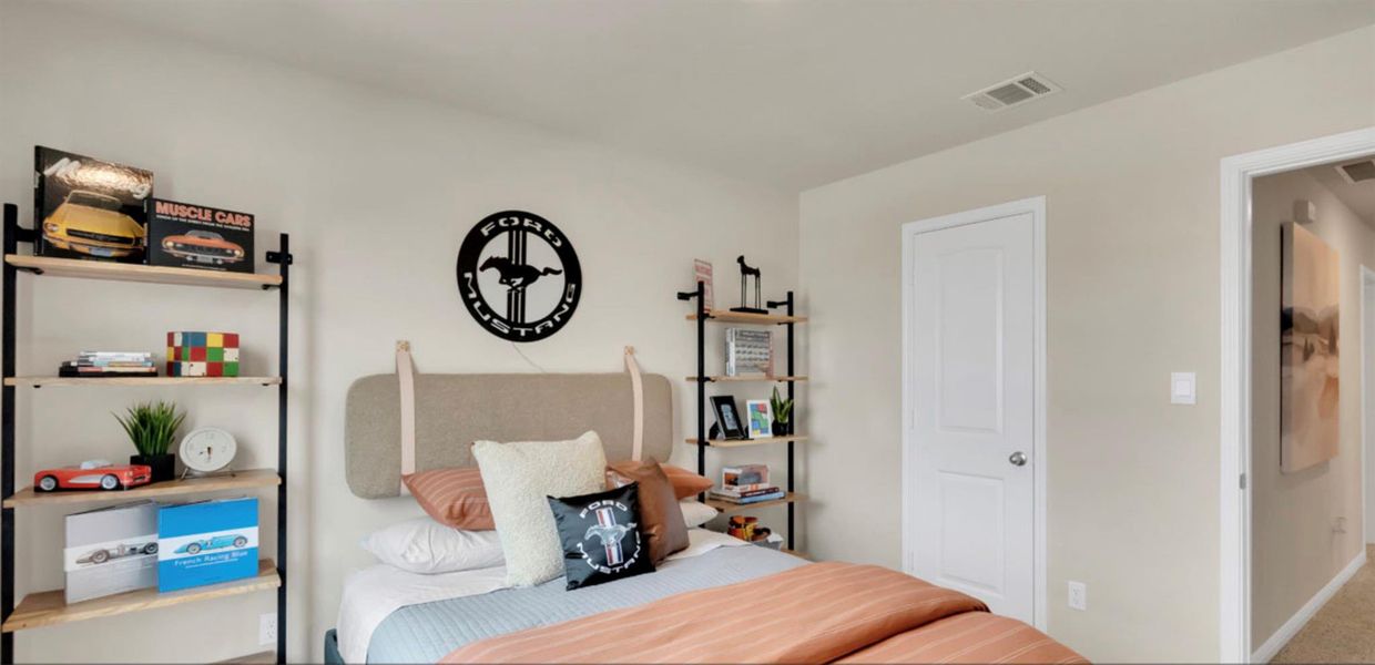 Bedroom featuring carpet flooring