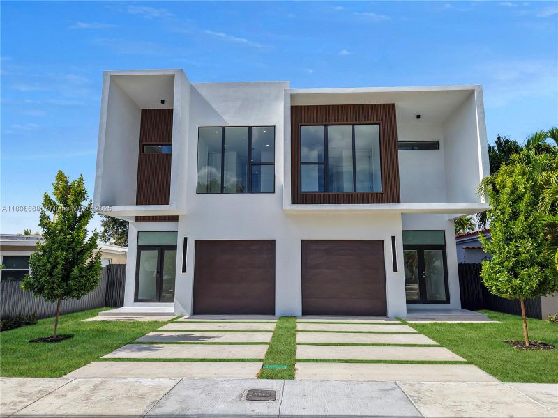 Front exterior of a new home in , Miami, FL, highlighting curb appeal (Image 23).