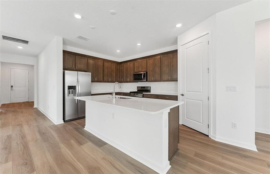 Furnished interior view inside a new home in Riverwood, Zephyrhills (Image 6).