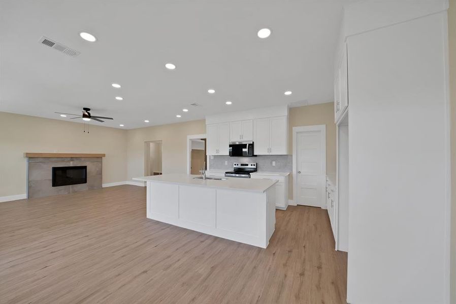 Furnished interior view inside a new home in , The Colony (Image 6).