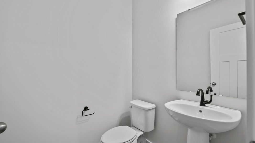 Representative furnished interior of a home built from the Jasmine by DRB Homes in Harrier Point, Woodruff (Image 10).