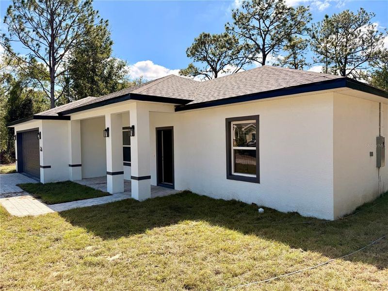 Exterior details and patio area of a home in , Citrus Springs (Image 3). Exterior details and patio area of a home in , Citrus Springs (Image 3).