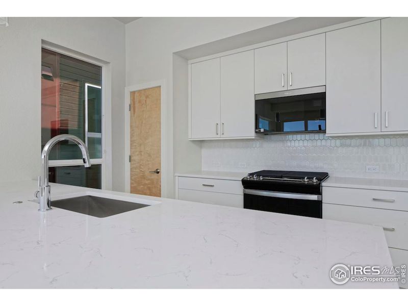 Kitchen has a large pantry