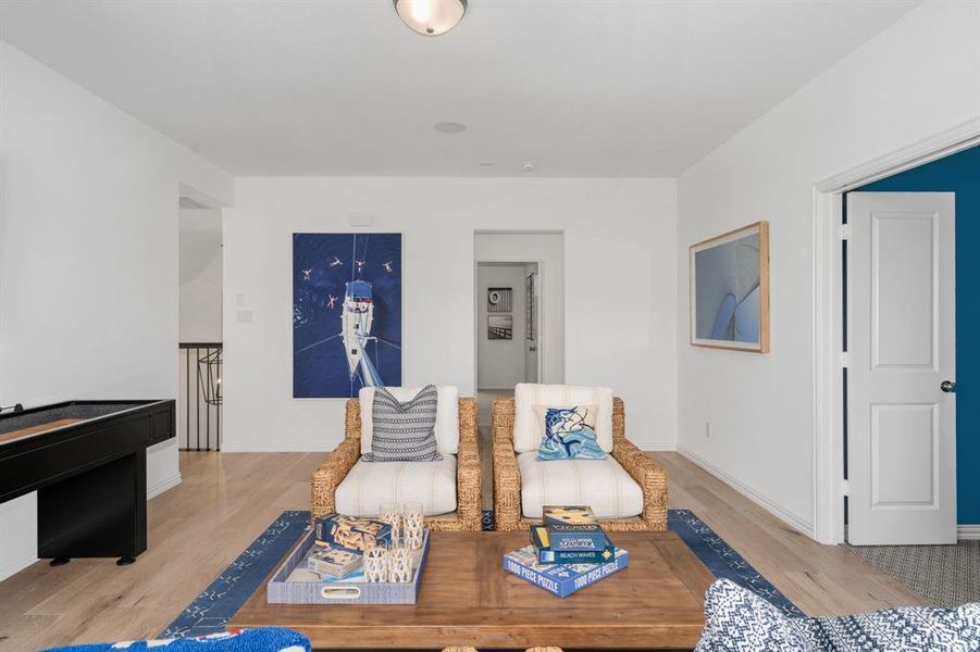 Living room featuring light hardwood / wood-style flooring