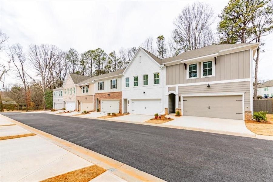 Front exterior of a new home in Cherokee Township, Acworth, GA, highlighting curb appeal (Image 24).