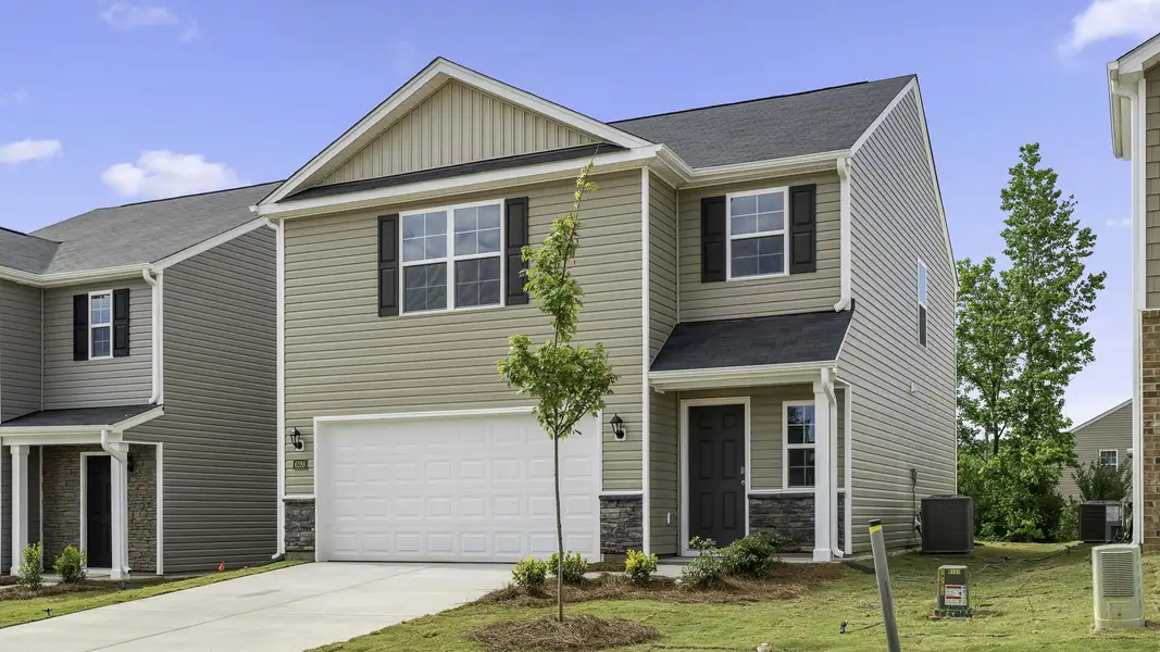 Front exterior of a new home in Chandler Pointe, Rural Hall, NC, highlighting curb appeal (Image 2). Front exterior of a new home in Chandler Pointe, Rural Hall, NC, highlighting curb appeal (Image 2).