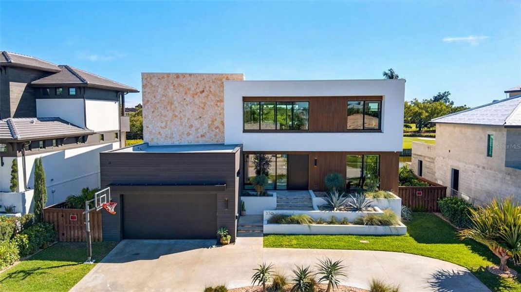 Front exterior of a new home in , St. Petersburg, FL, highlighting curb appeal (Image 27).