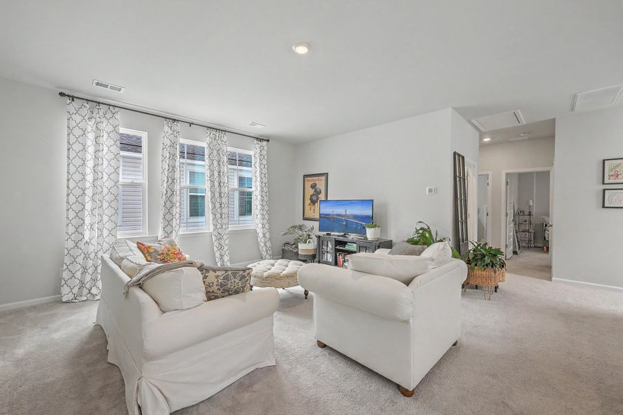 Furnished interior view inside a new home in Limehouse Village: Row Collection, Summerville (Image 18).