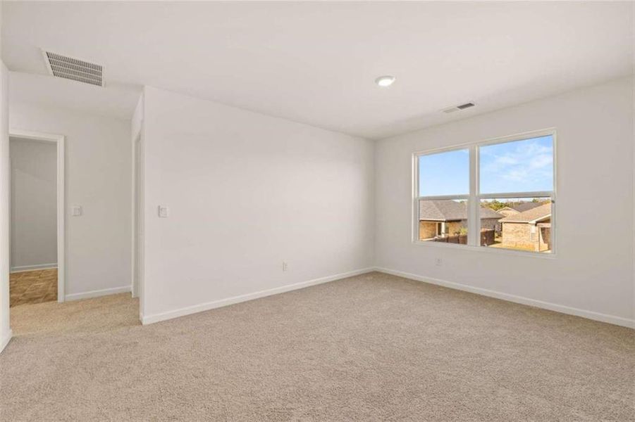 Spacious, unfurnished interior of a new home in The Preserve at Agricultural Village, Perry (Image 24).