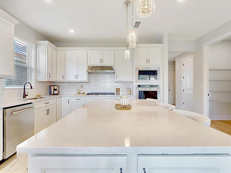 Furnished interior view inside a new home in Del Webb Sunbridge, St. Cloud (Image 7).