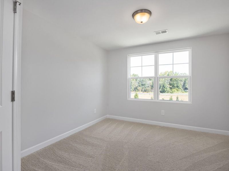 Spacious, unfurnished interior of a new home in Springvale, Fuquay Varina (Image 20).
