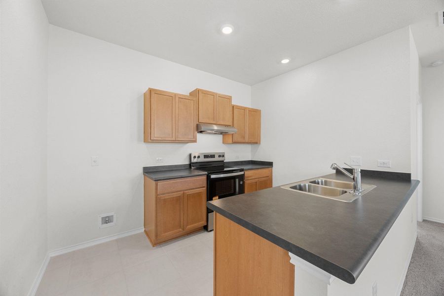 Furnished interior view inside a new home in Creekside at Estancia, Austin (Image 5).