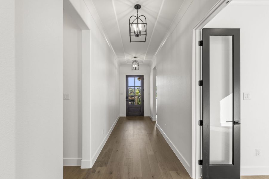 Representative unfurnished interior of a home built from the 5521 by Tradition Homes in Windsong Ranch, Prosper (Image 11).