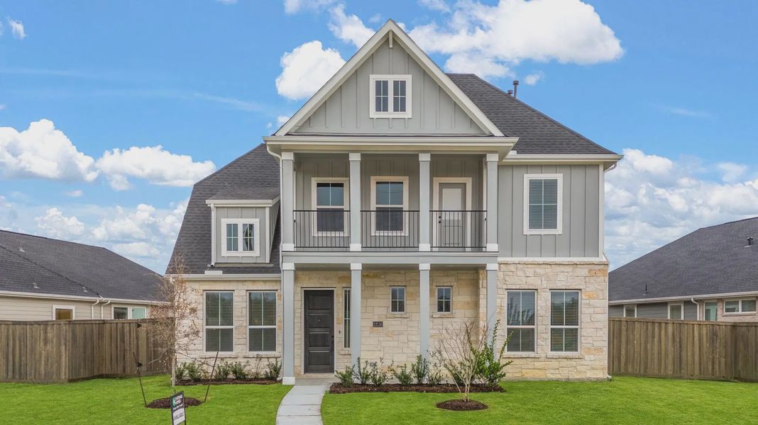 Representative exterior photo of a completed home built from the Sorenstam by Chesmar Homes in Riceland Alley Loads, Mont Belvieu, TX (Image 30).