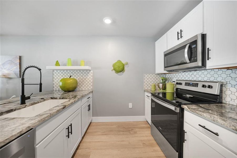 Furnished interior view inside a new home in , Port Charlotte (Image 47). Furnished interior view inside a new home in , Port Charlotte (Image 47).