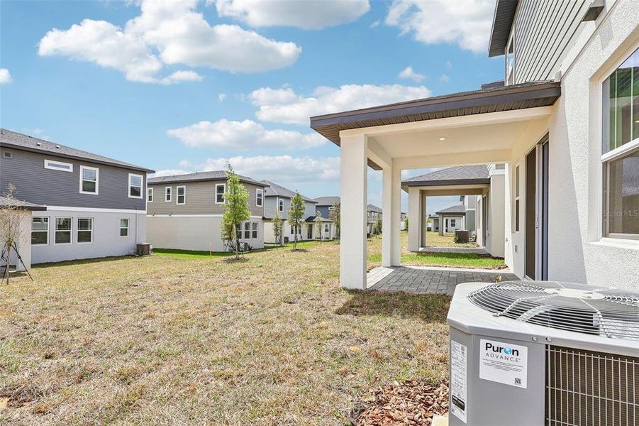 Exterior details and patio area of a home in Cyrene at Minneola, Minneola (Image 3).