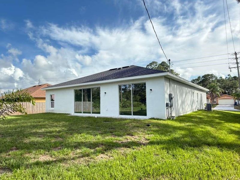 Exterior details and patio area of a home in , Palm Bay (Image 21).