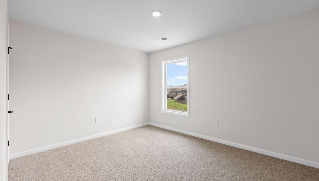 Representative unfurnished interior of a home built from the VERWOOD by D.R. Horton in Adams Glen, Greenville (Image 25).