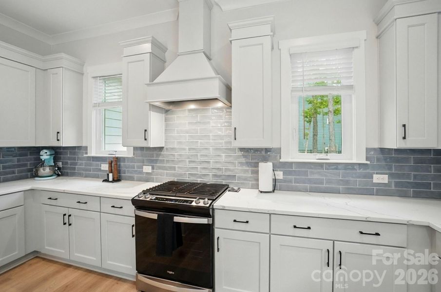 Gas range with hood