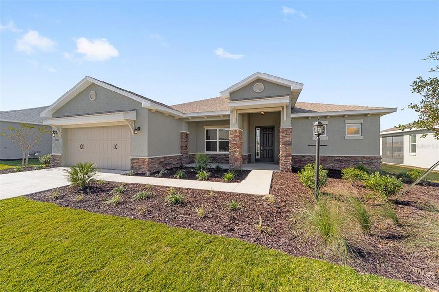 Front exterior of a new home in , Ocala, FL, highlighting curb appeal (Image 21). Front exterior of a new home in , Ocala, FL, highlighting curb appeal (Image 21).