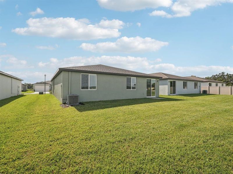 Exterior details and patio area of a home in Salt Meadows - Classic Series, Parrish (Image 2). Exterior details and patio area of a home in Salt Meadows - Classic Series, Parrish (Image 2).