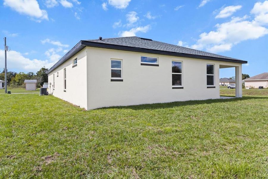 Exterior details and patio area of a home in , Ocala (Image 27).