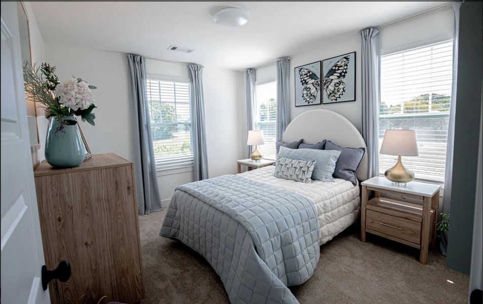 Bedroom featuring carpet floors