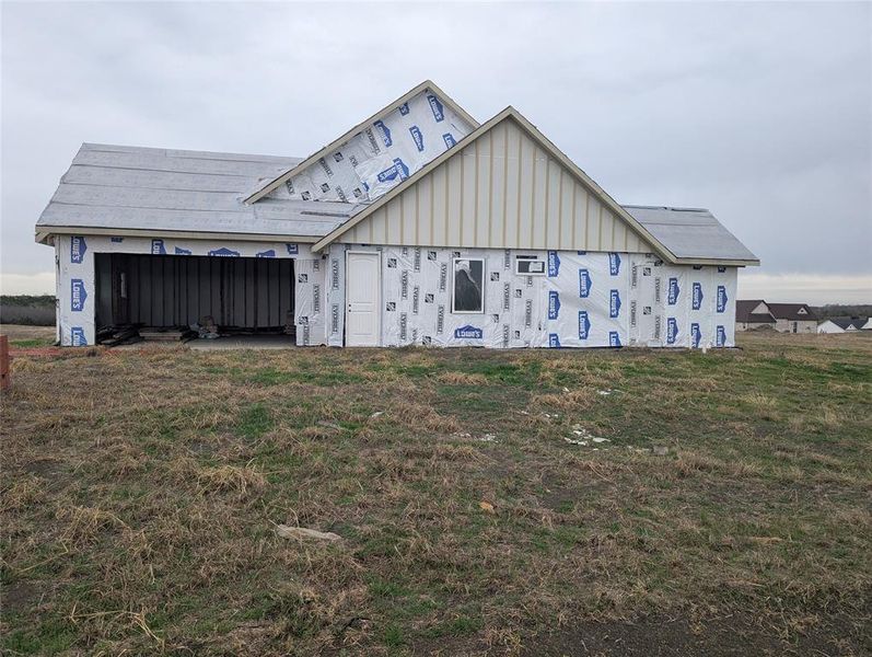 Side view, garage entry Side view, garage entry
